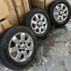Durable set of three Ford OEM chrome wheels mounted with Goodyear Wrangler Fortitude HT tires