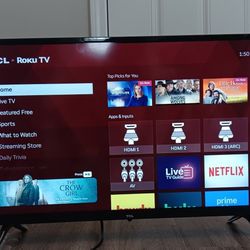 28in TCL Smart TV $100.00 Like New/ 1 Piece Coffee Table 1 Piece Matching Side Table $90.00 (Espresso Color)