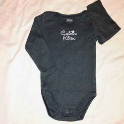 6-9 Months Onesie • by Calvin Klein