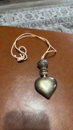 Silver toned puffed heart necklace