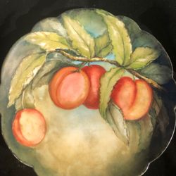 Vintage L. Chambers Limoges France scalloped green peaches plate. It measures 8-1/2”.