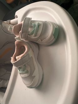 Baby tennis shoes and slip ones