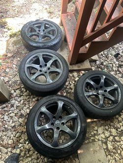17" Nissan OEM Wheels w/ 215/50R17 Pirelli & Leao Tires - Set of 4