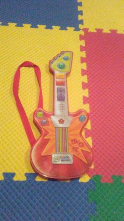 Small toy guitar