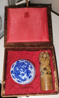 Art of some kind of Asian or Chinese family stamp. Not sure but it's hand crafted.