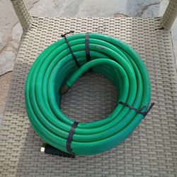 NEW WATER HOSE 100 FEET.