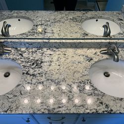 Olde Mill Cabinet Company granite-topped bathroom vanity, 61.5" long - available late May 2024