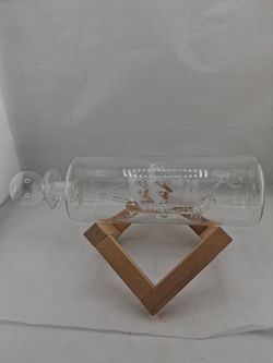 Vintage spun glass ship in bottle