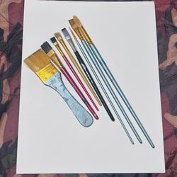 poster paper and paint brushes 