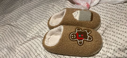 Used slippers size 7/8