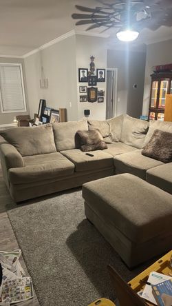 Three piece sectional sofa with ottoman