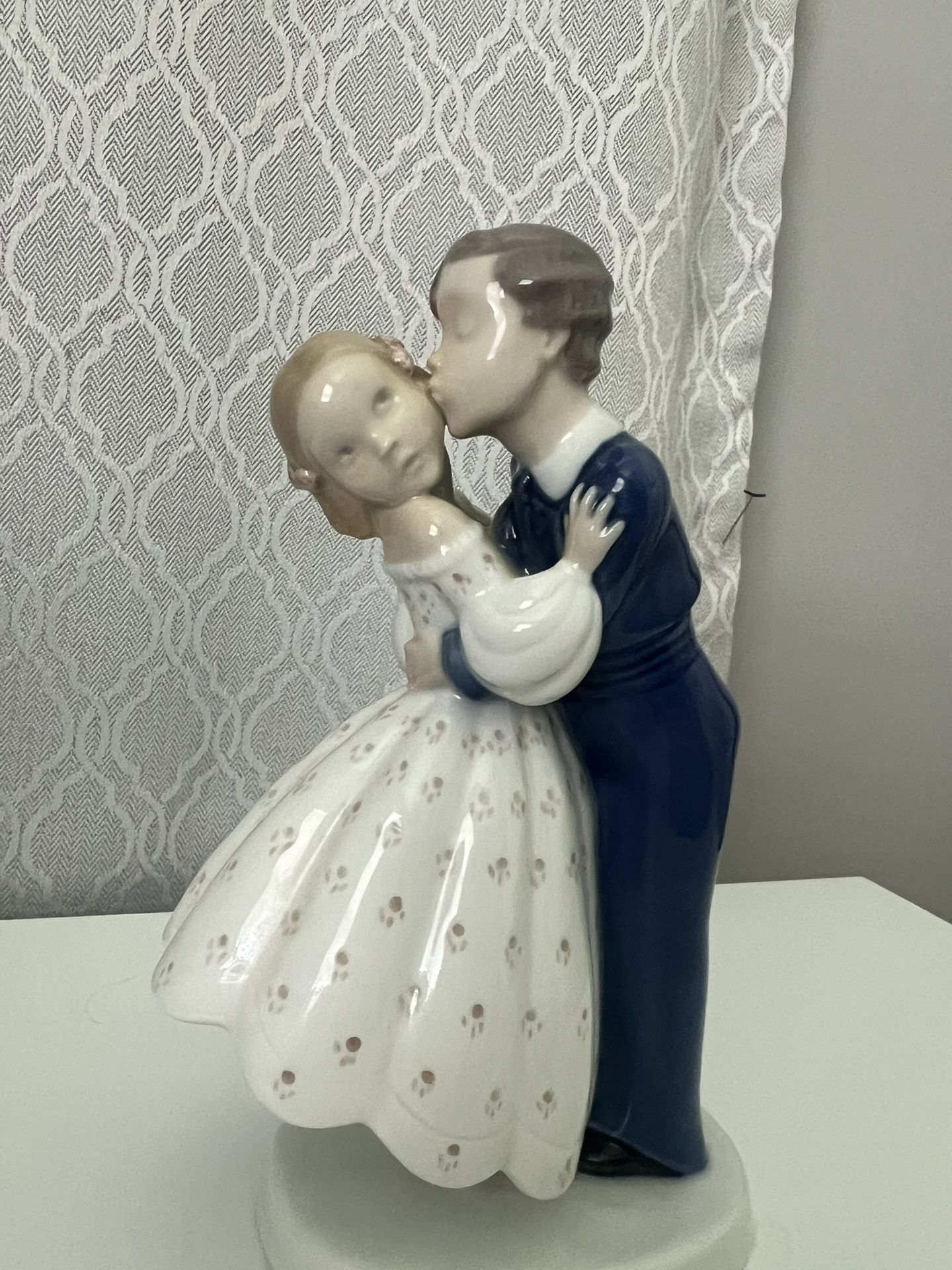 Youthful Boldness, Boy stealing a kiss Girl, 1970 Bing & Grondahl figurine
