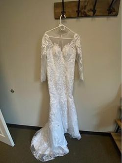 Long sleeve mermaid button up lace back wedding dress