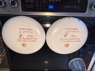 Pair of Signed Hand-Painted African Dance Plates $150