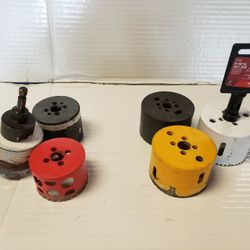 6 Hole Saws(one Brand New) With Bit Attachment 