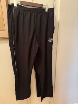 Men’s size large Brand New two exact pairs. New Balance activewear. Men’s size large Black and some white.