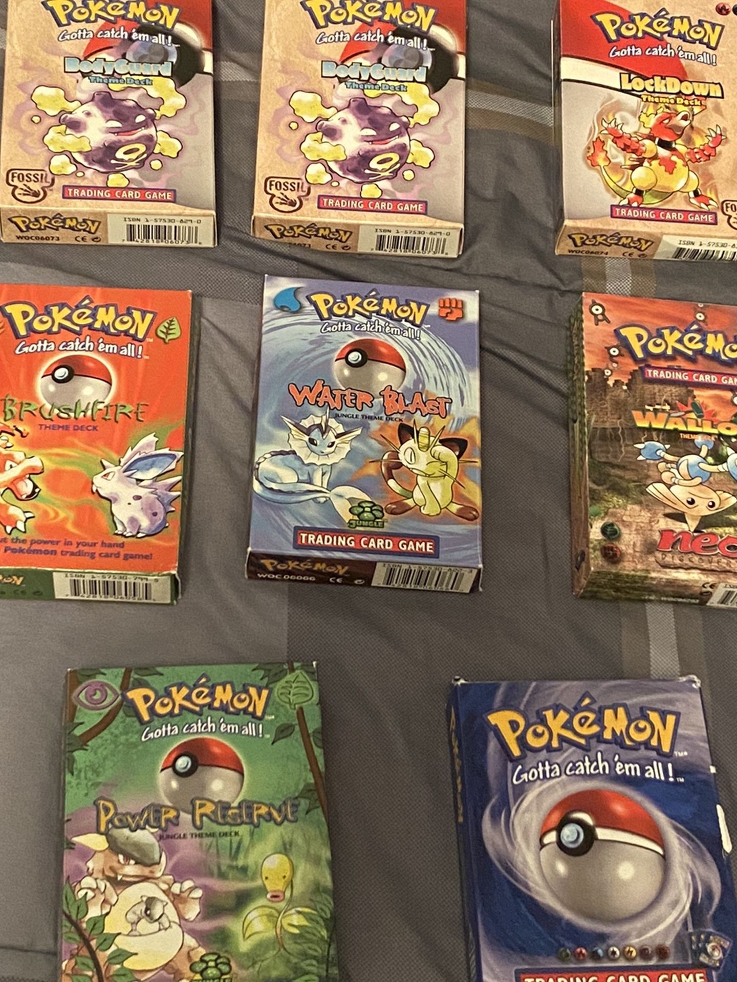 Assortment of Empty Pokémon Boxes and Manuals