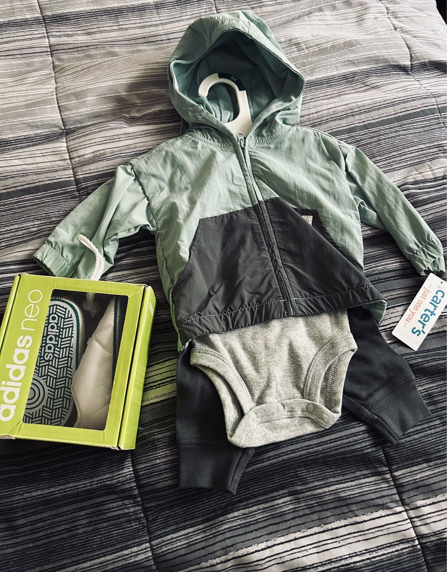 Little outfit for a baby and Adidas sneakers