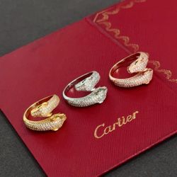 Diamond leopard head ring