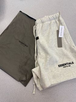 tags and the bag comes with it Oat color essentials shorts size medium brand new.