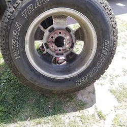 4 TIRES ALL WITH RIMS ALL THE SAME 