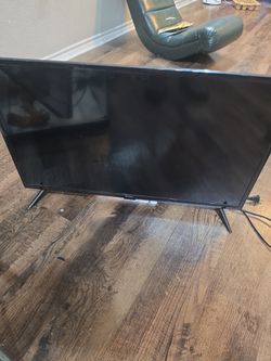 32" onn. Flat Screen TV with Stand.