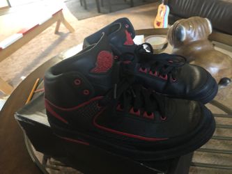Air Jordan’s 2 retro black and red size 6y