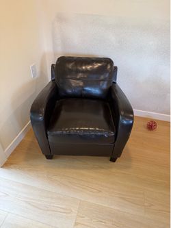 Brown leather club chair