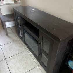 Dark brown media console w electric fireplace