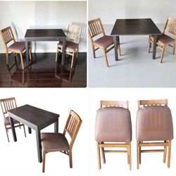 Small wood kitchen dinette table (two expandable leafs) $30, 2 fold down kitchen chairs $25