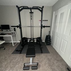 Assisted Smith Machine with Bench and Plates