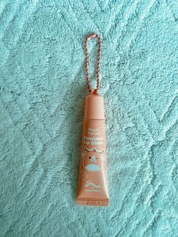 squishmallow x tonymoly howland lip gloss - peach parfait