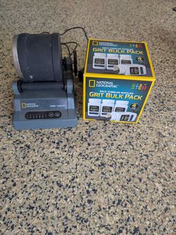 Rock tumbler with unopened grit