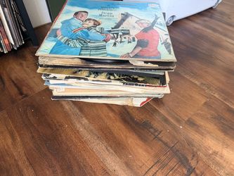 Stack of covered and loose vinyls