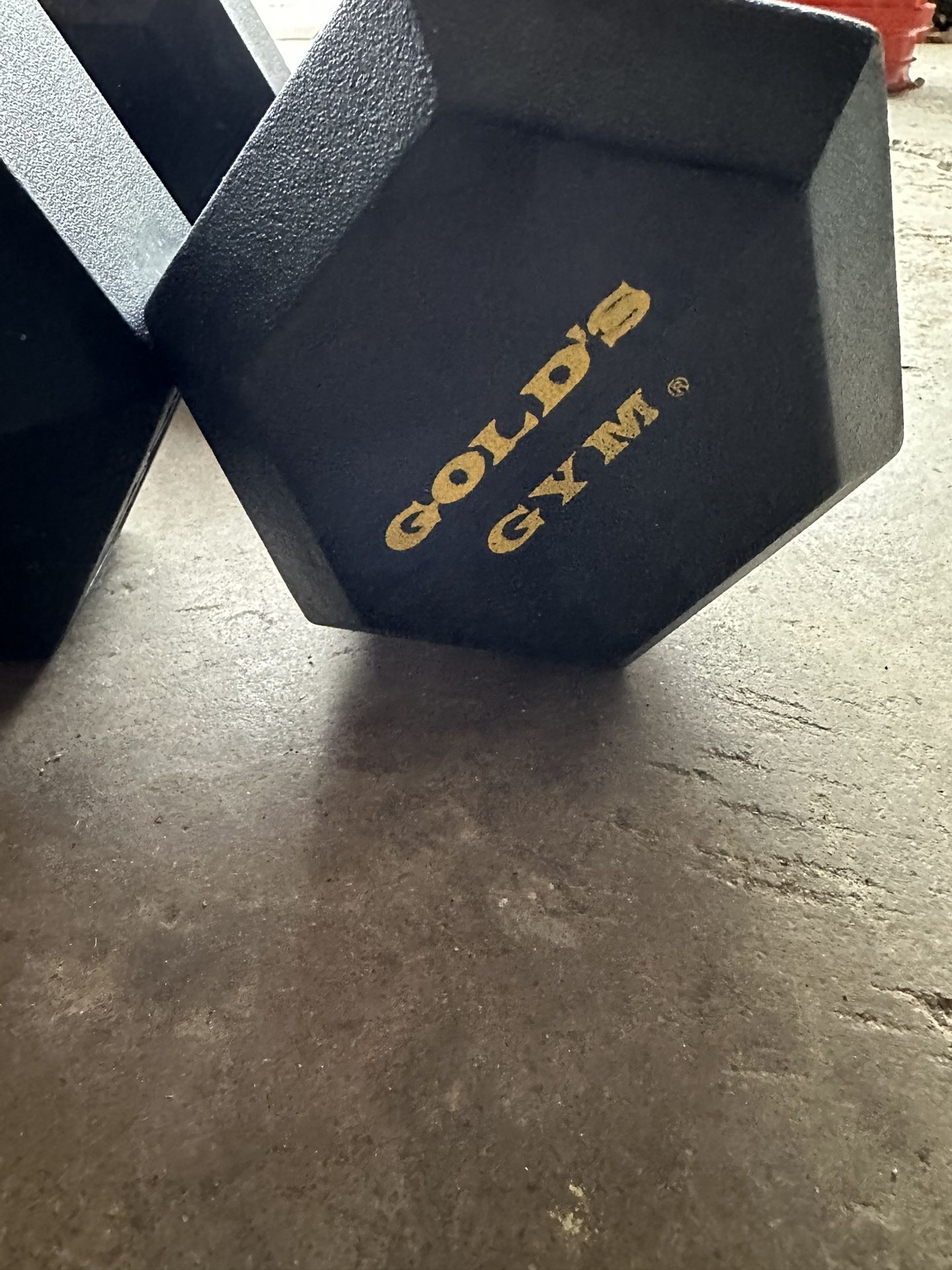 Two Dumbbells One 30 Pound, One 35 Pound .