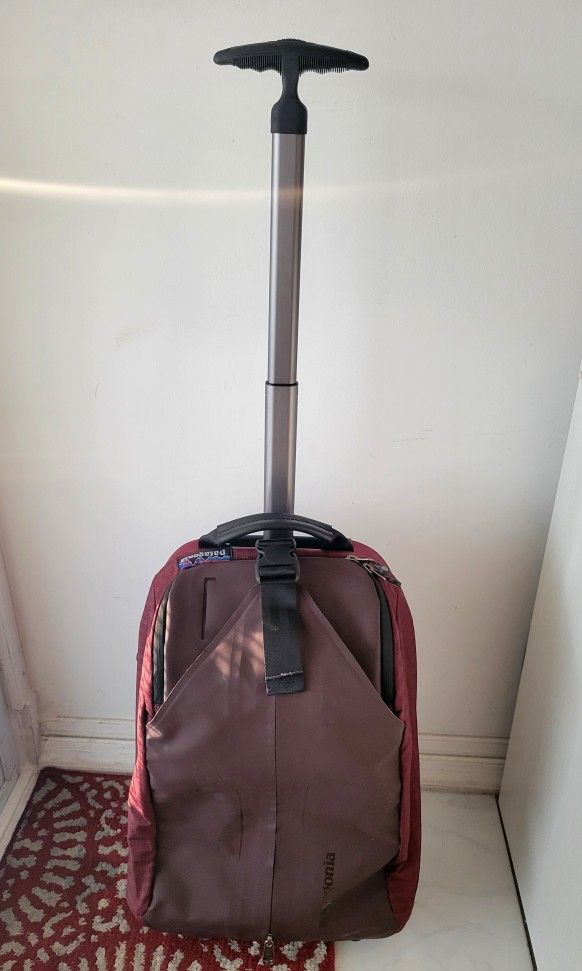 PATAGONIA Wheeled Duffle Luggage Suitcase Bag Travel Weather Shed Carry-On. Good Condition