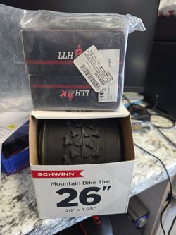 26" Bike tire and 2 new inner tubes. 26x1.95