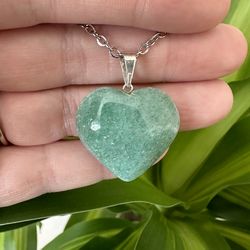 New, beautiful Green Aventurine Crystal heart necklace. Jewelry bag included .