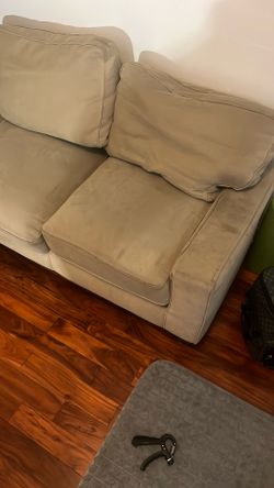 Tan Couch Can Fit 4 People Comfortably 