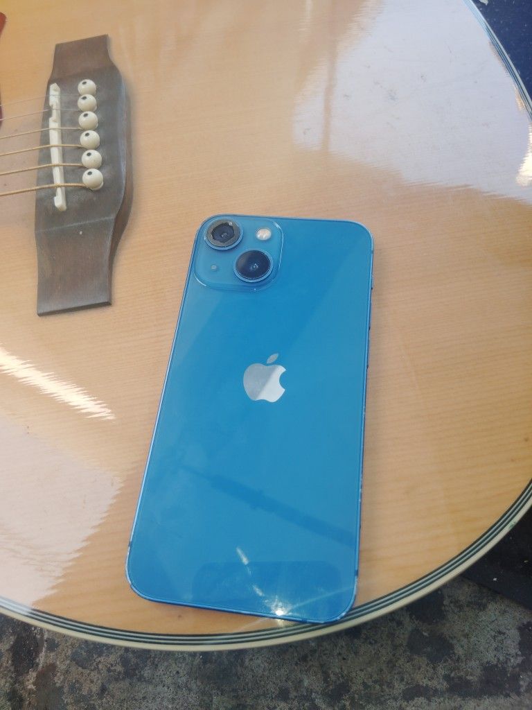 iPhone 13 Mini. In Good Condition .. It Has Glass Brock On The Camara.. 