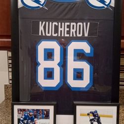 NIKITA KUCHEROV OF THE TAMPA BAY LIGHTING, FRAMED JERSEY.