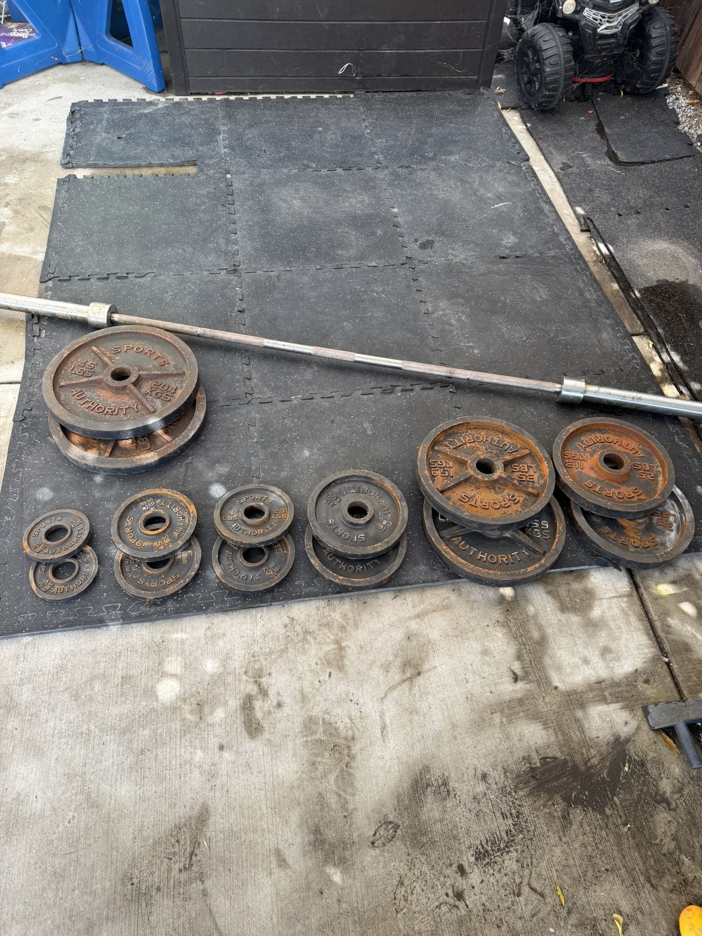 255 Ibs Of Weight Plates With Barbell