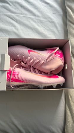 Pink Nike elite cleats