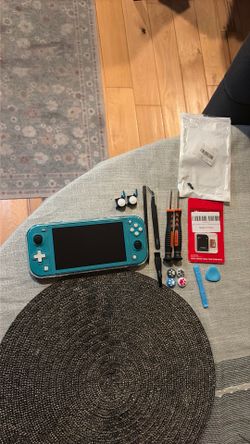 Nintendo switch lite with repair kit and clear protecting case and micro sd card