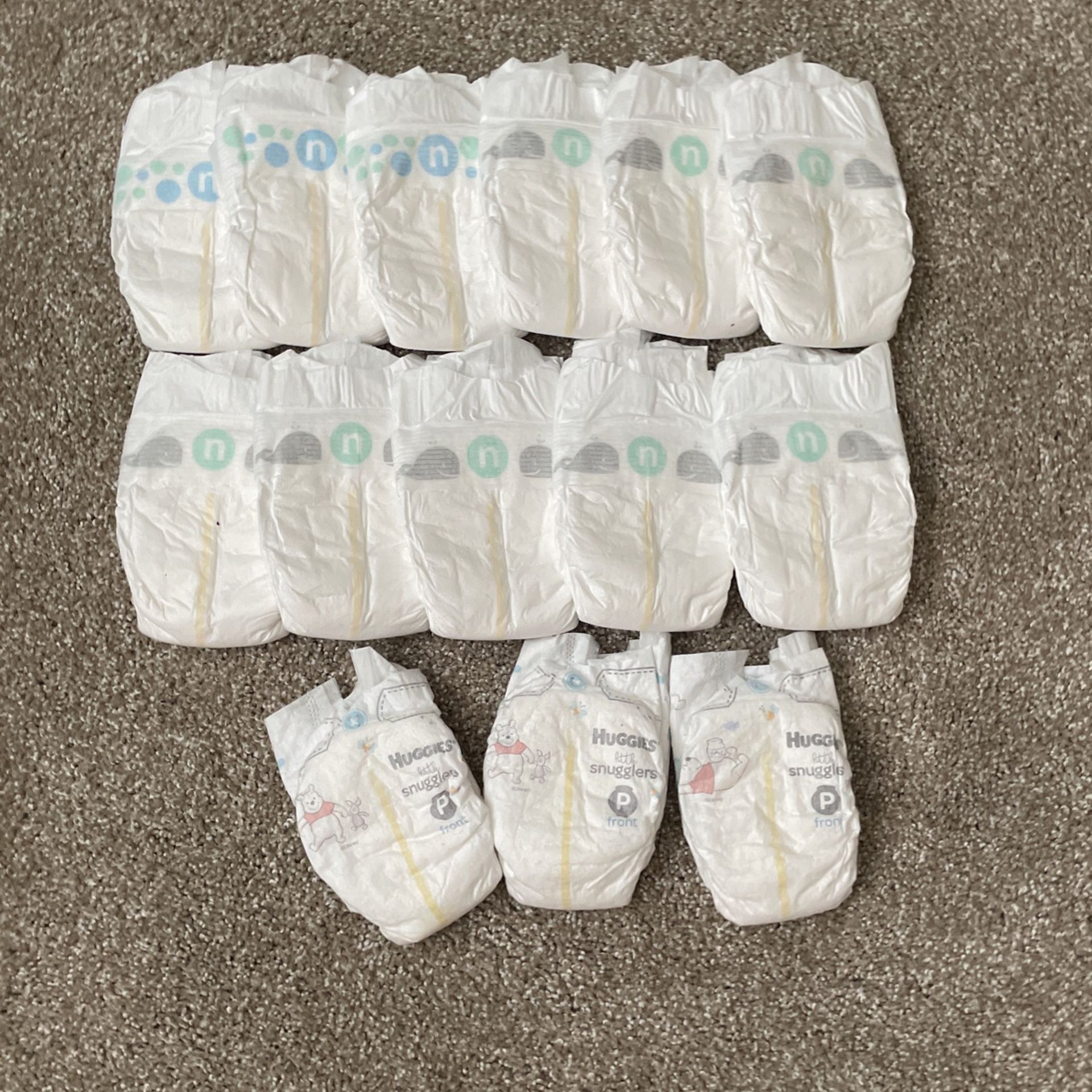 11 Newborn And 3 Preemie Diapers for Sale in Roxborough, CO