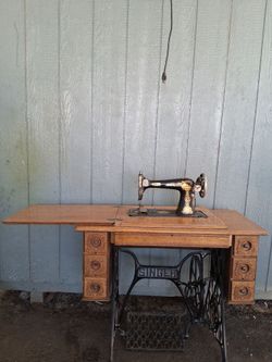 Antique Singer Treadle Sewing Machine with Cabinet