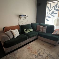 Comfy grey L shaped couch w/ royal green covers