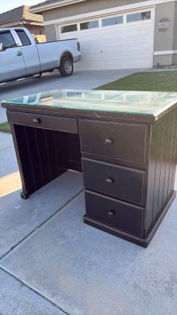 Desk with drawers and glass top