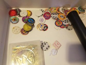 Lots of Pogs and neat 90s slammers