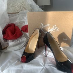 CHRISTIAN LOUBOUTIN SIZE 7